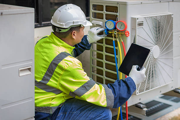 Professional Hvac technician working in Harvest, AL